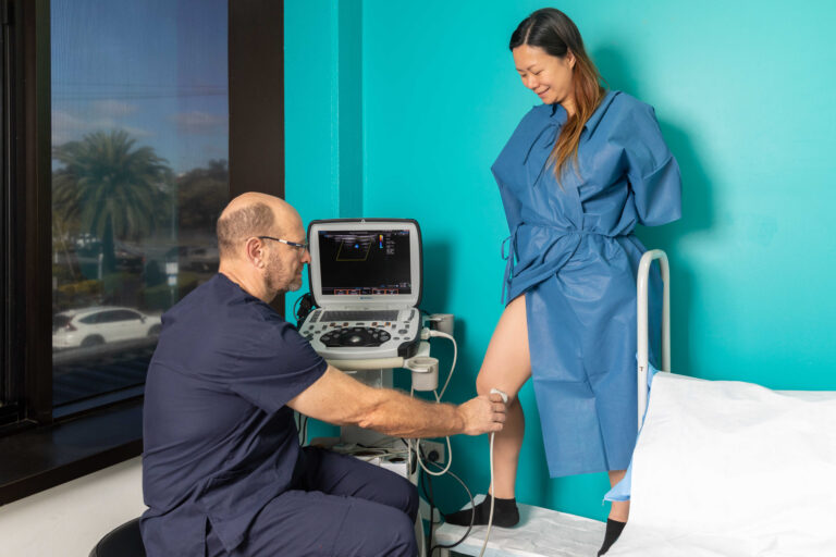 Dr Stuart McMaster using ultrasound imaging on a patient's legs. Could be linked to sleep
