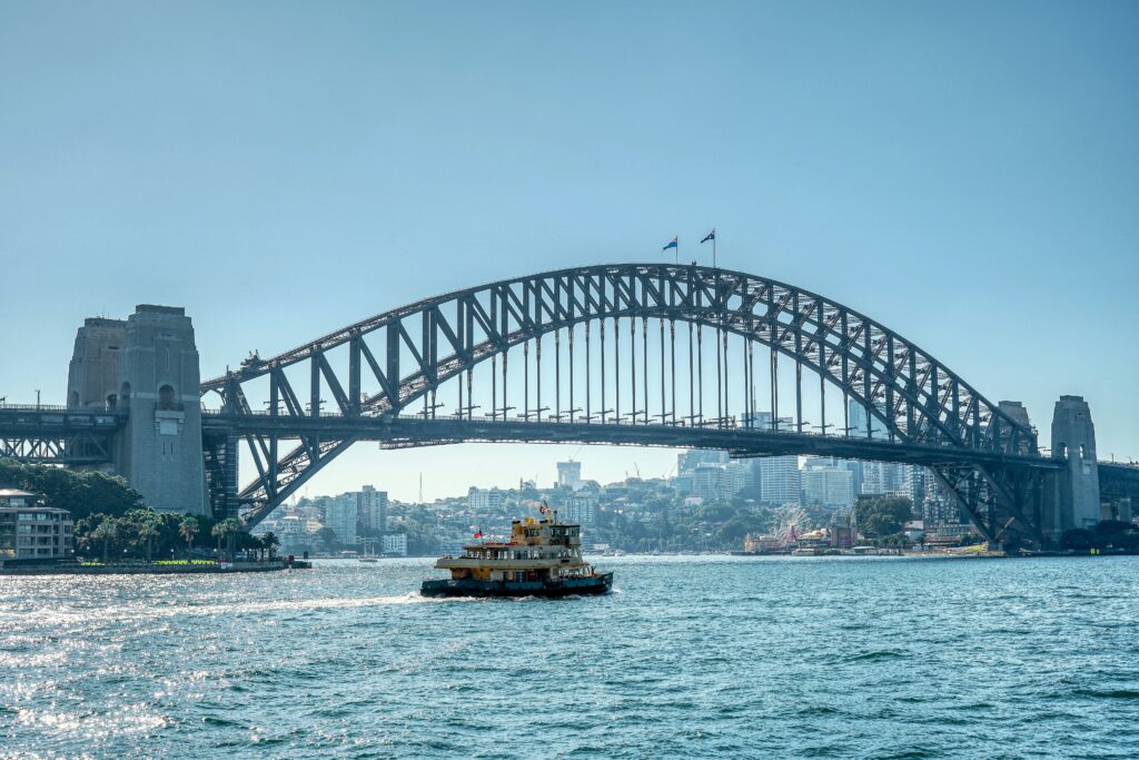 Sydney Harbour bridge with ferry in foreground