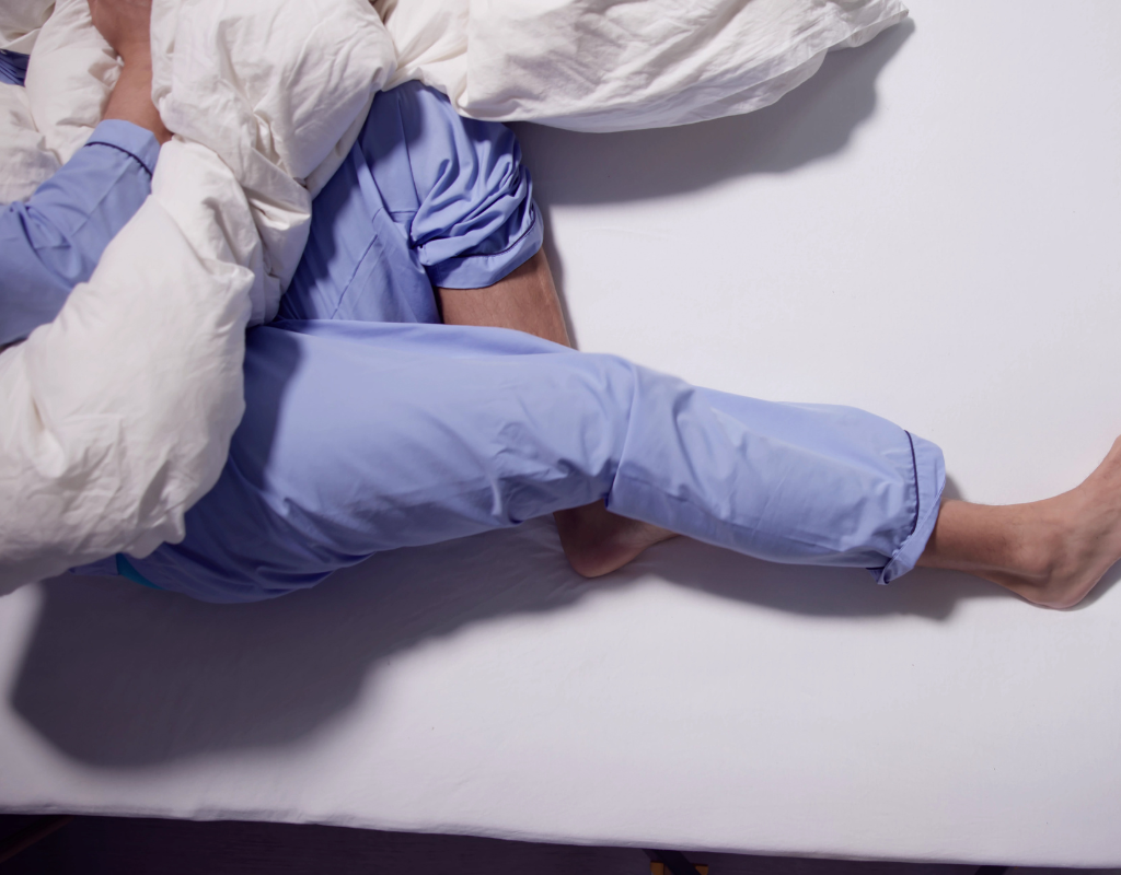 Restless legs struggling to sleep.